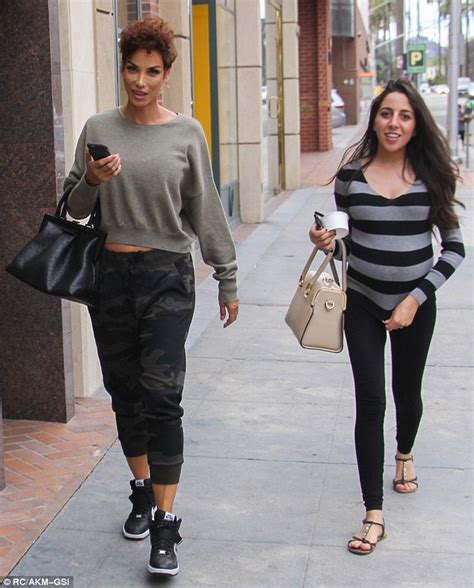 Nicole Murphy Looks Sporty Chic For A Day Of Retail Therapy With A Gal