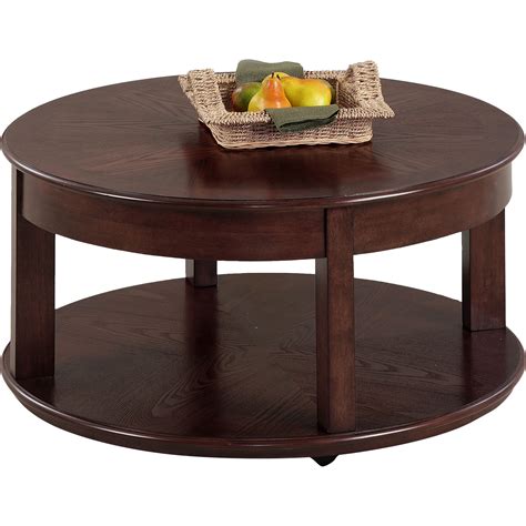 Unique, architectural and very modern round, glass and chrome coffee table. Darby Home Co Wilhoite Castered Round Coffee Table ...
