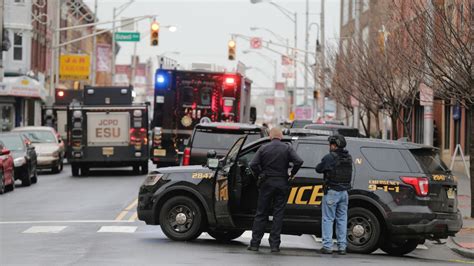 Jersey City Shootout Police Officer Among 6 Killed In Shooting Standoff 2 Suspects Dead
