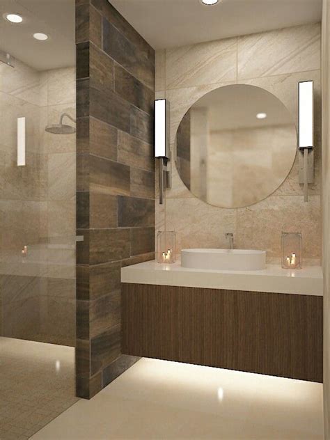 Valvo es un centro de exclusividad que poniendo atención en cada uno de los detalles busca construir espacios armoniosos, brindando experiencias inigualables a través del más alto diseño en cocinas y baños. Lavabo espejo redondo muro duela | Cuartos de baños ...