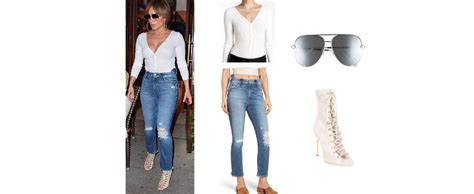 Jennifer Lopez`s White Top Jeans Sunglasses And Boots August 2017