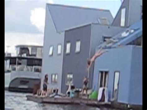 Amsterdam Chick Dives From House In Water Naked Youtube