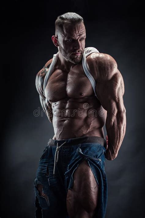 Strong Athletic Man Fitness Model Torso Showing Big Muscles Over Stock