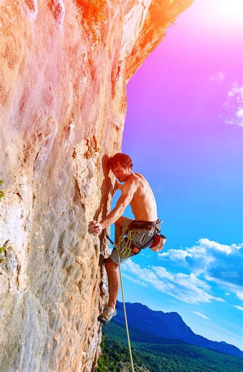 Rock Climber Climbing Up A Cliff Stock Photo Image Of Alone Mountain
