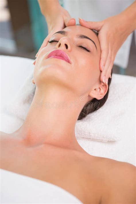 Attractive Woman Receiving Head Massage At Spa Center Stock Image