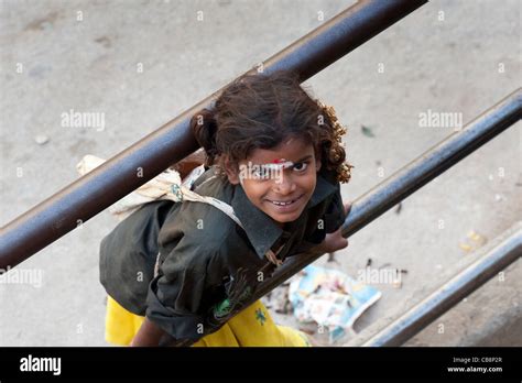 Poor Indian Beggar Girl Looking Up Selective Focus Stock Photo Alamy