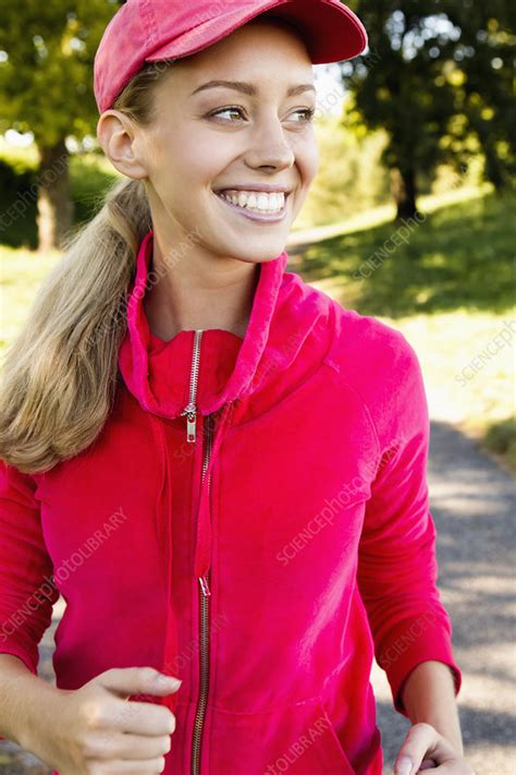 Smiling Woman Jogging Outdoors Stock Image F0064145 Science