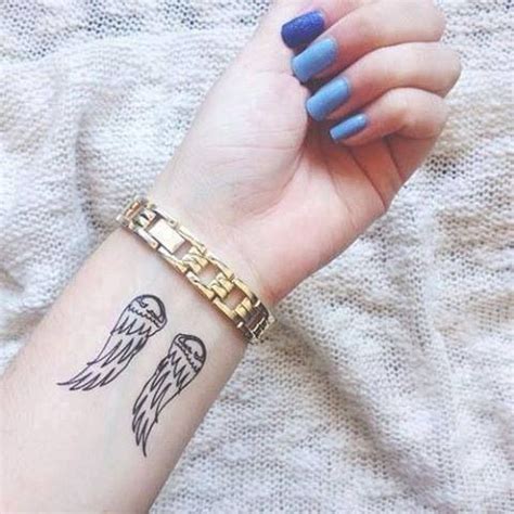 Explore the top 35 wrist tattoos and get wrist tattoos have become a mainstream fashion staple in the modern era. Angel Wing Wrist Tattoo | Tattoos/Piercings | Pinterest