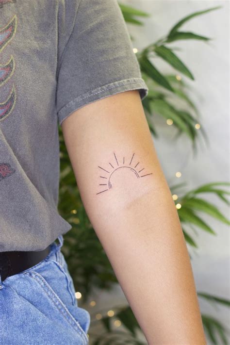sunset sunrise fine line minimalist tattoo above elbow tattoo sunset tattoos elbow tattoos