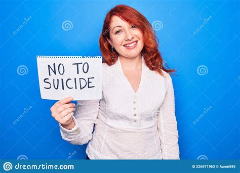 Young Redhead Woman Asking For Stop Depression Holding Paper With Not