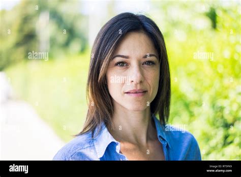 Portrait Of A Beautiful Woman In Nature Stock Photo Alamy