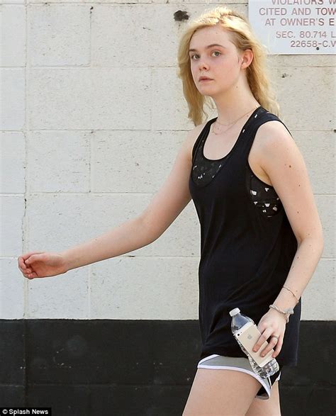 Elle Fanning Hobbles Out Of Dance Class With Trainers Falling Off Her