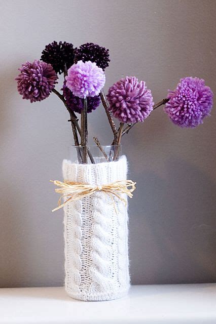 Grab your favorite colours of yarn and follow our step by step tutorial. Vase sweater and pom pom flowers on real sticks. | Pom pom ...