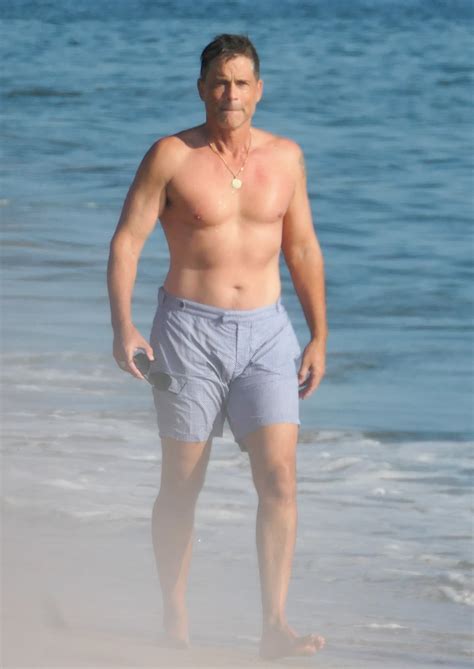 Shirtless Rob Lowe 56 Looks Half His Age As He Hits The Beach In Swim