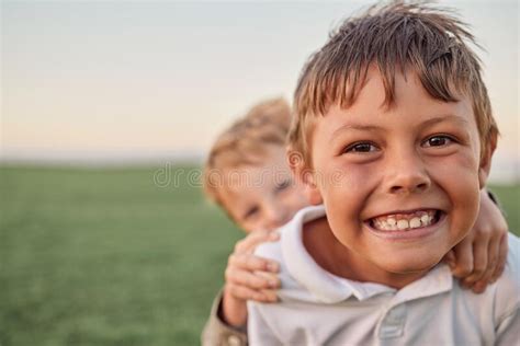 Friends Brothers And A Smile Portrait In A Field Of Happy Boys Having