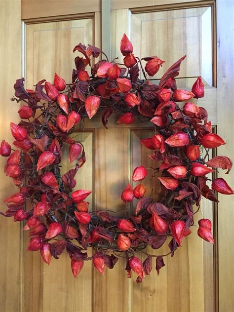 Maybe you would like to learn more about one of these? Dried Chinese Lanterns wired to a grapevine wreath. | Fall ...