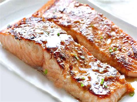 A delicious sticky glaze is brushed on top of salmon fillets before they are baked in the oven. thesalmoncookbook.com, Salmon recipes, Best Salmon recipes ...
