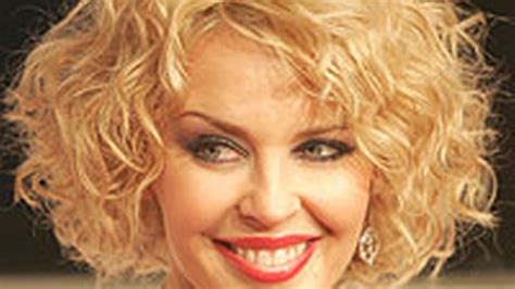 a curly haired kylie picks up music award in germany mirror online