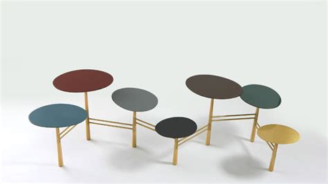 Available in 7 tiers, the modular pebble table is both functional and flexible. Nada Debs