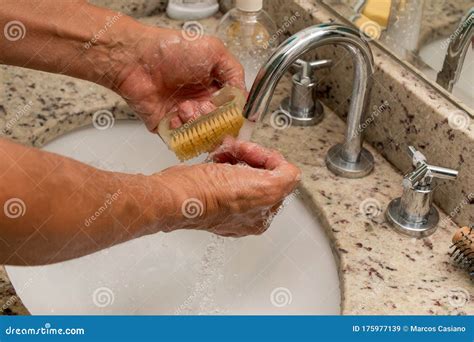 Man Washing His Hands With A Scrub Brush And Soap Stock Image Image