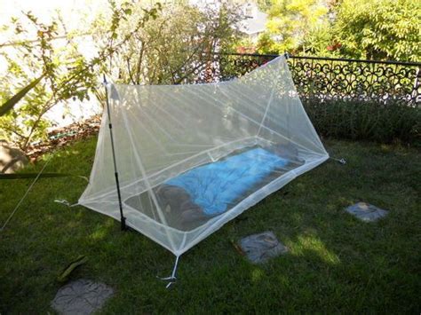 Automatic rolling up mosquito net in white color with lateral guides. Homemade mosquito net tent | Tent, Mosquito net, Mosquito