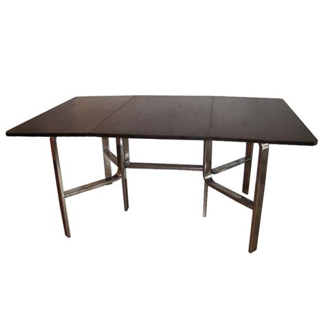 Metal kitchen tables from the 1940s and 1950s actresses interesting. 1940's Chrome and Wood Drop Leaf Dining Table at 1stdibs
