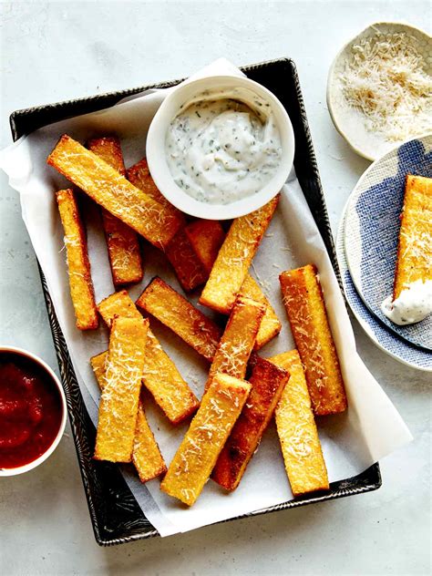 Easy polenta fries seasoned with vegan parmesan cheese and herbs! Polenta Fries - Spoon Fork Bacon