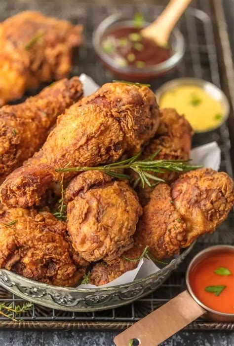 You've seen those massive packs of chicken thighs sitting in the bottom of the case, looking large enough to feed a crowd. up close picture of fried chicken drumstick in serving bowl