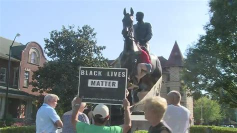 Castleman Monument Debate Continues Protesters Wrap Banner Around Statue