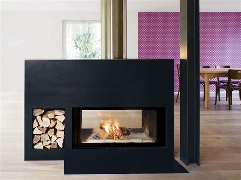 Making the decision to install a freestanding woodburning stove in your home rather than installing a wood stoves heat your space more efficiently as they are able to disperse through all four sides rather than just through the front. Double-sided wood-burning steel fireplace with panoramic ...