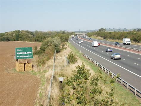 Billboard advertising by M40 motorway,... © David Hawgood :: Geograph