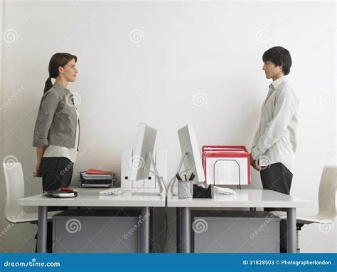 Business People Standing At Computer Desks Stock Image Image Of Adult Looking 31828503