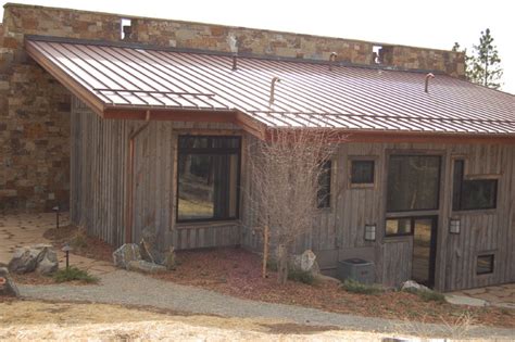 Western Rust Standing Seam Metal Roof Rustic Exterior Denver By