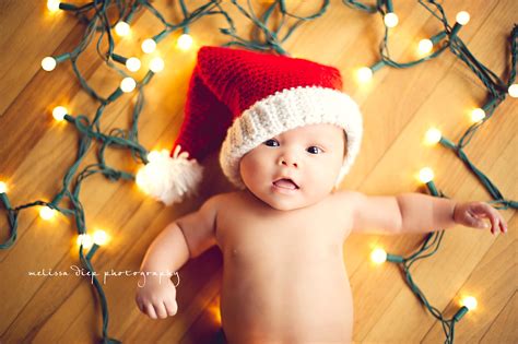 If you are ever unsure what to buy for a newborn baby, just nip into the white company and it will sort you out. Christmas Newborn Photography