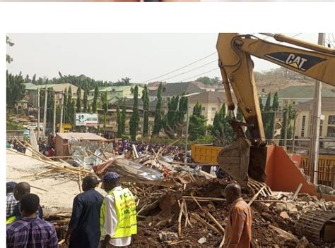 Two Dead 50 Trapped As Building Collapses In Abuja Afimag