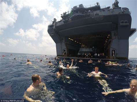 Us Navy Sailors Leap From Ships Around The World During Swim Call