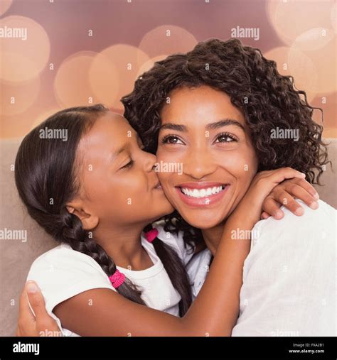 Portrait Of A Mother And Daughter Holding Each Other Stock Photo Alamy