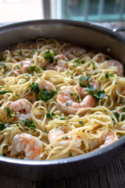 Add tomato, olives, chardonnay wine, leeks, lemon juice, capers, salt, and cayenne pepper. Easy Shrimp Scampi Linguine Recipe with Garlic, Lemon ...