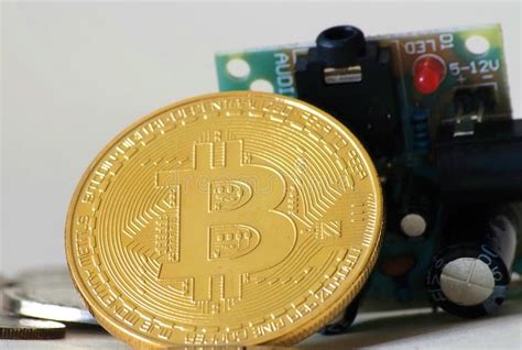 Bitcoin Leaning On Circuit Board Stock Photo Image Of Closeup Round