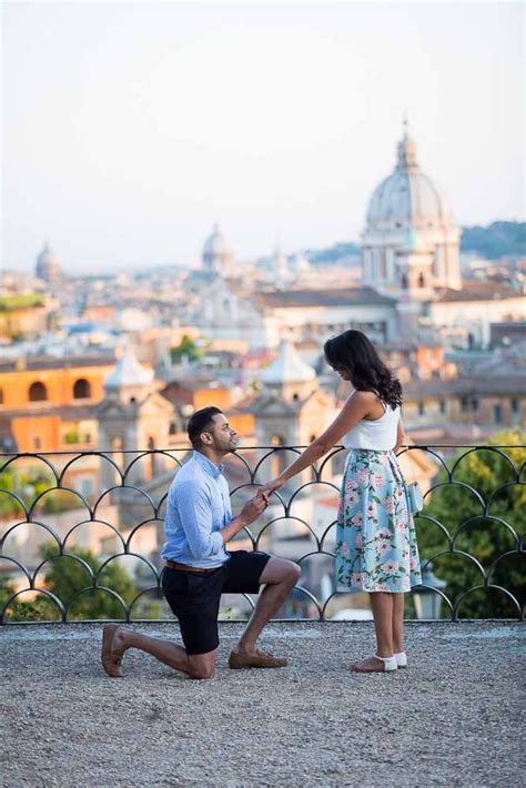 man knee down surprise rome proposal photography at parco del pincio in rome italy proposal