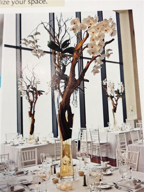 Tree branch with flowers centerpiece | Flower centerpieces, Centerpieces, Wedding centerpieces