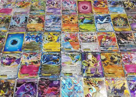 Random assortment of pokemon, energy, and trainer cards. Pokemon Card Lot 100 OFFICIAL TCG Cards Ultr