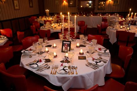 Creating a point of separation for the bride and groom, the sweetheart. Red and White Round Reception Tables with Candelabras and ...