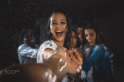 Group Of Friends Dancing In The Rain Dancing In The Rain Group Of