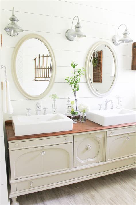 Check this contemporary farmhouse bathroom over at domino. Can't Find The Perfect Farmhouse Bathroom Vanity? DIY IT ...