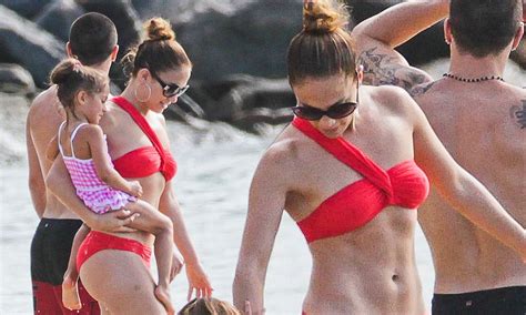 Jennifer Lopez Shows Off Her Trim Figure In A Sexy Red Bikini