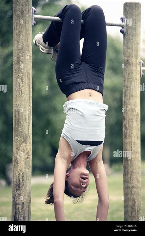 Woman Hanging Upside Down From Hi Res Stock Photography And Images Alamy