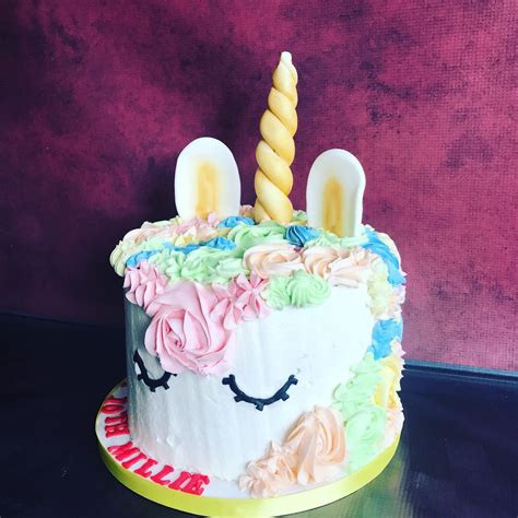 Cat riding a unicorn sweater. Here's a large unicorn cake with a golden horn ...