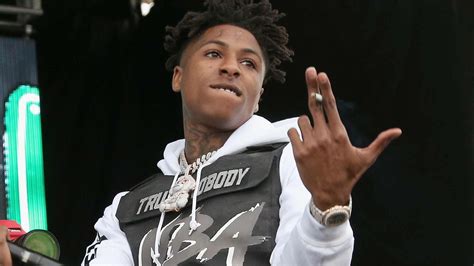 Nba Youngboy Is Wearing Black White Dress Standing In Black Wallpaper