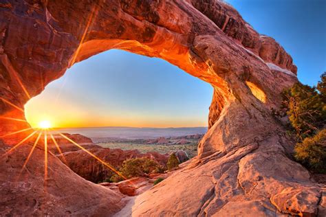 Sunrise At Partition Arch In Arches National Park Moab Utah Gunnison